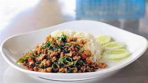 Rice topped with stir-sried chicken breast and basil leaves(ข้าวผัดกะเพราอกไก่)