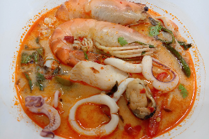 ต้มยำทะเลรวมน้ำข้น Thai tom yam soup seafood mixed hot and spicy (Main dish without rice)