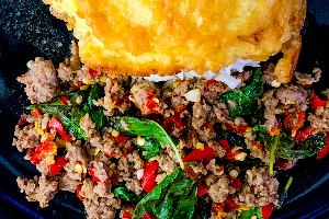 ข้าวกะเพราเนื้อโคขุน | Rice topped with Stir-fried Beef and Holy Basil