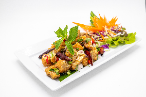 ปลากะพงยำสมุนไพร ( Spicy Sea Bass Salad With Fresh Herbed Thai style )
