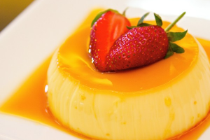 Strawberry Pudding With Peach Syrup